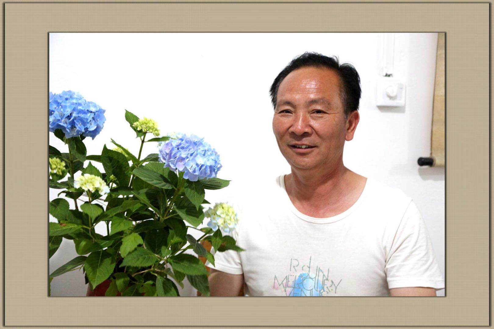 一面面锦旗赞良医--记“金康推拿”诊所医生丁勇